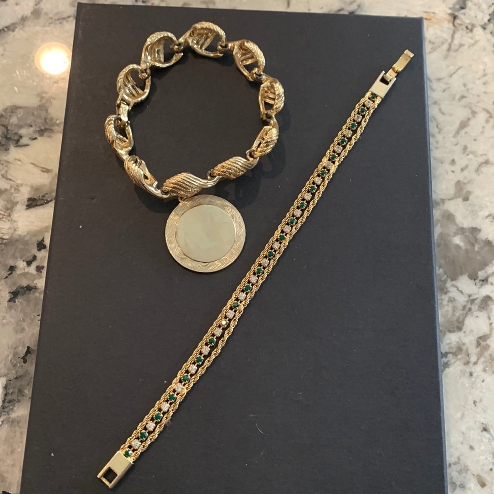 Two goldtone bracelets - 1 w/ green&white rhinestones - 1 w/ engraveable charm